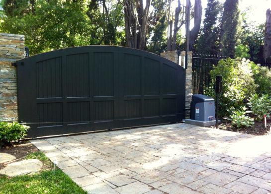 Automatic sliding store driveway gates