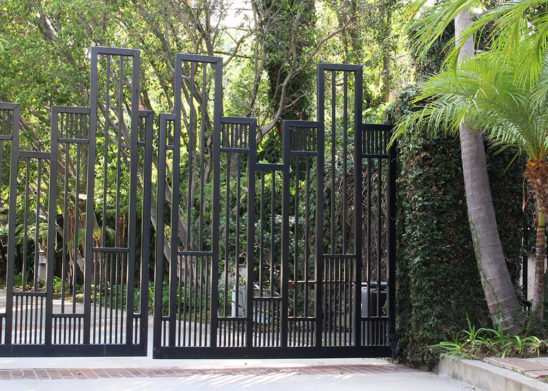 contemporary geometric design bifold auto steel gate