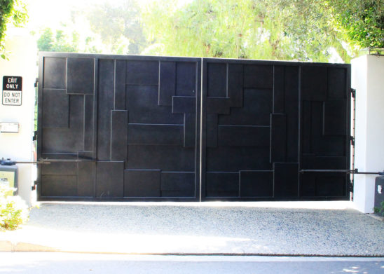 black layered steel auto bifold gate