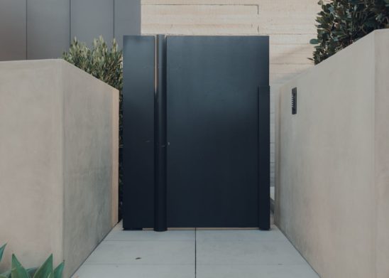 Flush Metal Clad Pedestrian Gate With Concealed Center Pivot Los Angeles Orange County